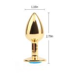 Plug Anal Dorado con Gema Azul